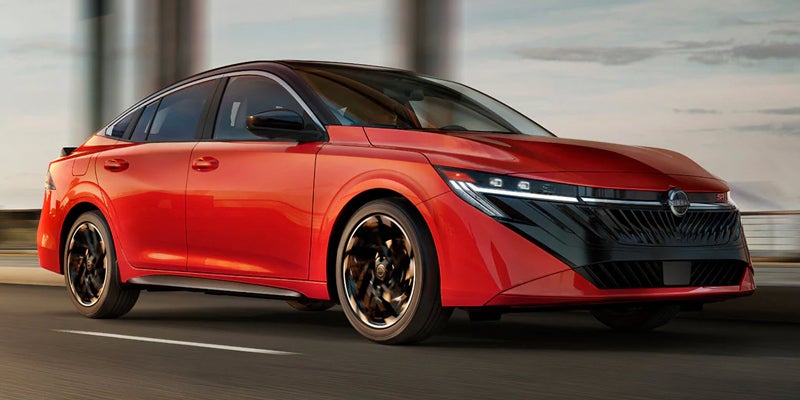 2027 Nissan Sentra driving along a highway.